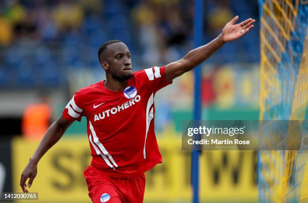 Dodi Lukebakio of Hertha BSC celebrtes after he scores the 4th goal during extra time over Jasmin Fejzic, goalkeeper of Eintracht Braunschweig during...