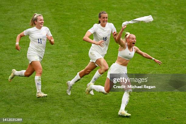 Chloe Kelly of England celebrates scoring their side's second goal with teammates Lauren Hemp and Jill Scott during the UEFA Women's Euro 2022 final...