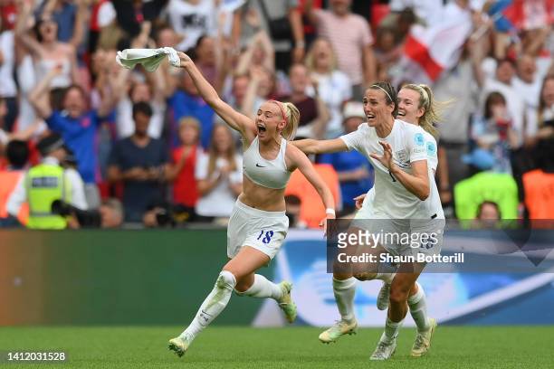Chloe Kelly of England celebrates with teammates after scoring their side's second goal in extra time during the UEFA Women's Euro 2022 final match...