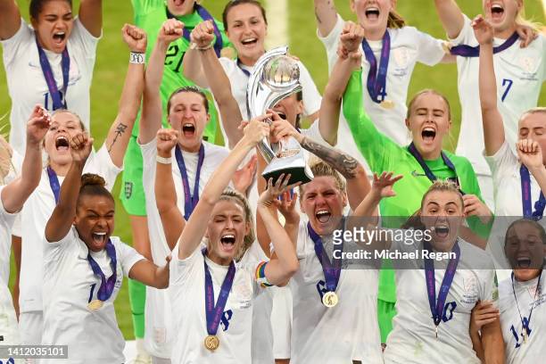 Leah Williamson of England lifts the UEFA Women’s EURO 2022 Trophy after their side’s victory during the UEFA Women's Euro 2022 final match between...