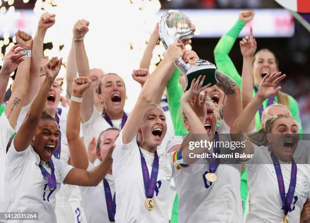 Leah Williamson and Millie Bright of England lift the UEFA Women’s EURO 2022 Trophy after their sides victory during the UEFA Women's Euro 2022 final...