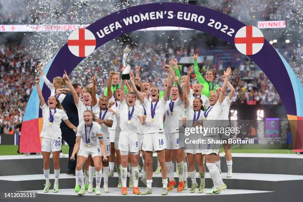 Ellen White and Jill Scott of England lifts the UEFA Women's EURO 2022 Trophy after their sides victory during the UEFA Women's Euro 2022 final match...