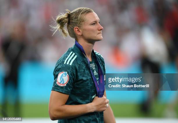 Alexandra Popp of Germany reacts after the 2-1 loss during the UEFA Women's Euro 2022 final match between England and Germany at Wembley Stadium on...
