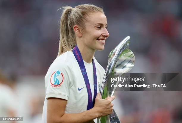 Leah Williamson of England celebrates with the UEFA Women’s EURO 2022 Trophy after their side's victory during the UEFA Women's Euro 2022 final match...