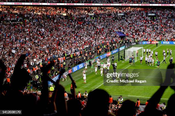 General view as players of England celebrate in front of their fans with the UEFA Women’s EURO 2022 Trophy after the final whistle of the UEFA...