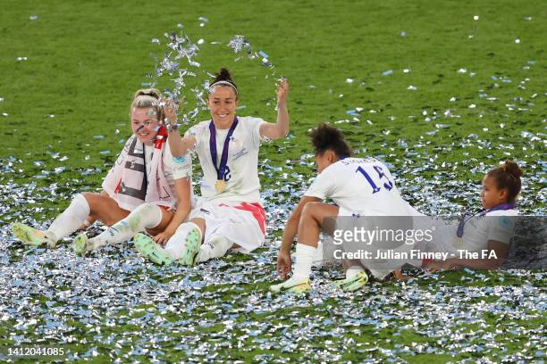 Lauren Hemp, Lucy Bronze, Demi Stokes and Nikita Parris of England celebrate following the UEFA Women's Euro 2022 final match between England and...