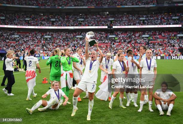 Beth Mead of England lifts the UEFA Women’s EURO 2022 Trophy as players of England celebrate after the final whistle of the UEFA Women's Euro 2022...