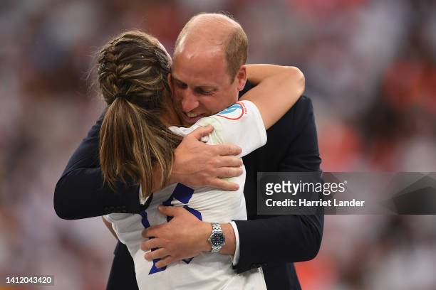 Jill Scott of England is embraced by Prince William, Duke of Cambridge, after the final whistle of the UEFA Women's Euro 2022 final match between...