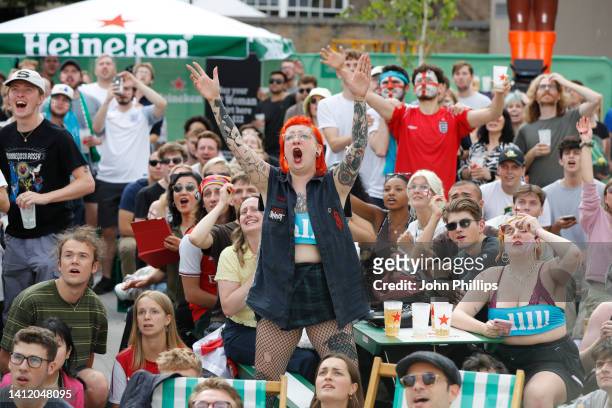 Fans during the UEFA Women's EURO 2022 Final screening at the Heineken Greener Bar fan zone at The Truman Brewery on July 31, 2022 in London, England.