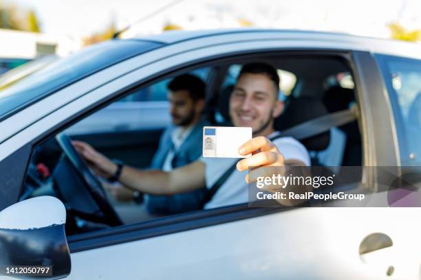 i finally got my lincence - rijbewijs stockfoto's en -beelden