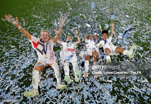 Lauren Hemp, Lucy Bronze, Nikita Parris and Demi Stokes of England celebrate following the UEFA Women's Euro 2022 final match between England and...