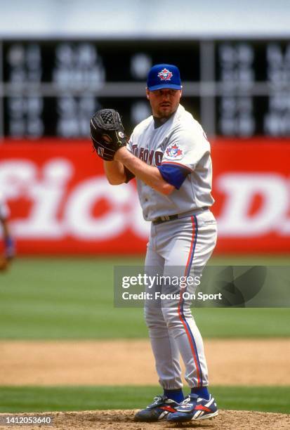 Roger Clemens of the Toronto Blue Jays pitches against the Oakland Athletics during a Major League Baseball game circa 1997 at the Oakland-Alameda...