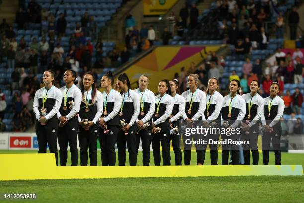 Bronze Medalists, Team New Zealand stand for their national anthem during the Rugby Sevens Women’s medal ceremony on day three of the Birmingham 2022...