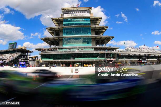 General view of racing in front of the Indianapolis Motor Speedway Pagoda during the NASCAR Cup Series Verizon 200 at the Brickyard at Indianapolis...