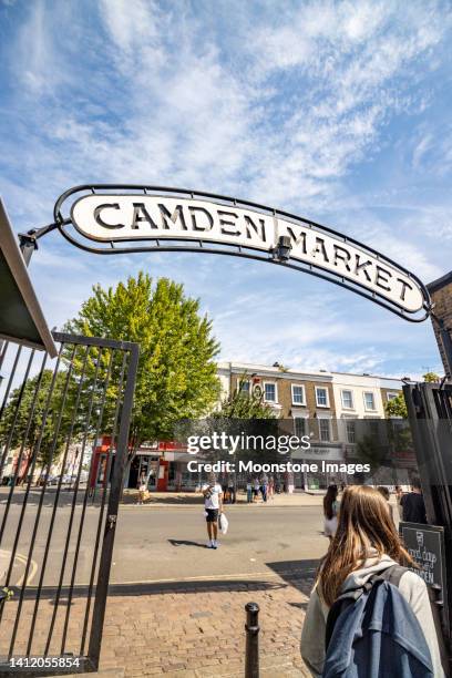 entrance sign to camden market in borough of camden, london - camden town stock pictures, royalty-free photos & images