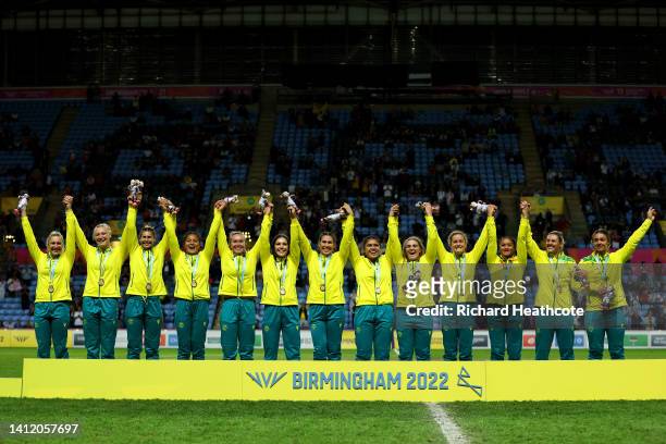 Gold Medalists, Team Australia celebrate during the Rugby Sevens Women's medal ceremony on day three of the Birmingham 2022 Commonwealth Games at...