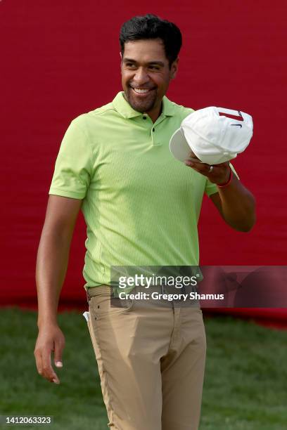 Tony Finau of the United States celebrates on the 18th green after winning the Rocket Mortgage Classic at Detroit Golf Club on July 31, 2022 in...