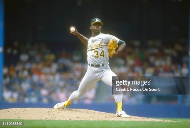 Dave Stewart of the Oakland Athletics pitches against the Detroit Tigers during a Major League Baseball game circa 1991 at Tiger Stadium in Detroit,...