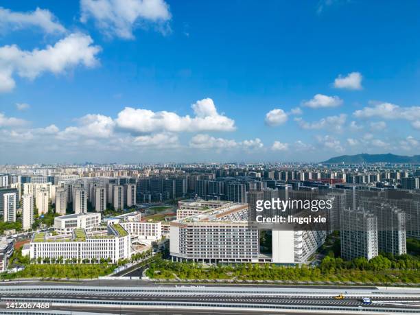 the city scenery of hangzhou, china under the blue sky and white clouds - hangzhou bildbanksfoton och bilder