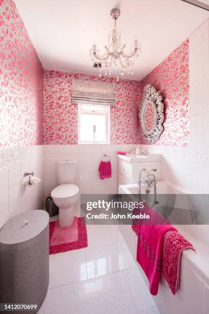 property bathroom interiors - bath mat stockfoto's en -beelden