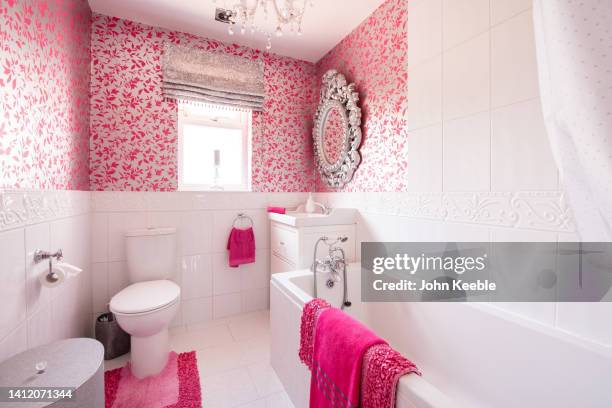 property bathroom interiors - bathmat stock pictures, royalty-free photos & images