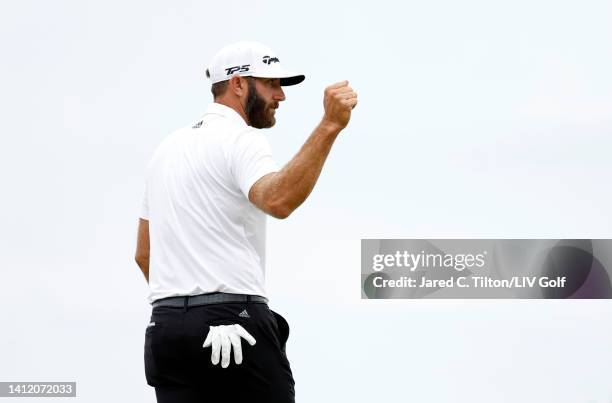Team Captain Dustin Johnson of 4 Aces GC reacts after putting on the 18th green during day three of the LIV Golf Invitational - Bedminster at Trump...