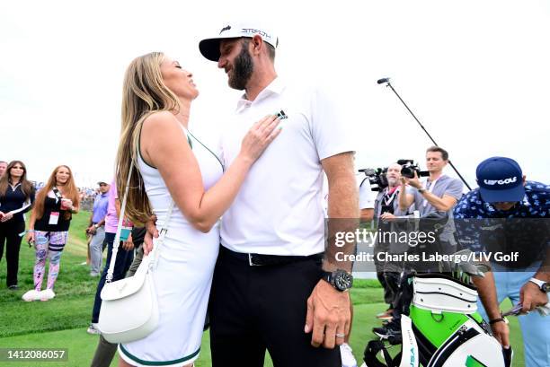 Team Captain Dustin Johnson of 4 Aces GC celebrates with wife Paulina Gretzky after Johnson won third place individual and first place team awards...