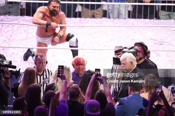 Andrade El Idolo and Ric Flair in action during Ric Flair's Last Match at Nashville Municipal Auditorium on July 31, 2022 in Nashville, Tennessee.