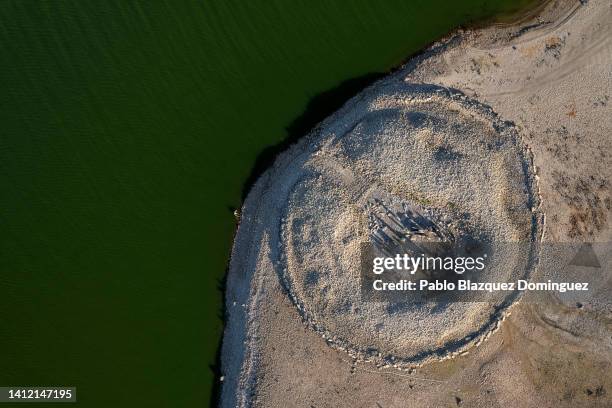 The Dolmen of Guadalperal, sometimes also known as "The Spanish Stonehenge" is seen above the water level at the Valdecanas reservoir, which is at 27...