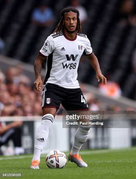 Kevin Mbabu of Fulham runs with the ball during the pre-season friendly match between Fulham and Villareal CF at Craven Cottage on July 31, 2022 in...