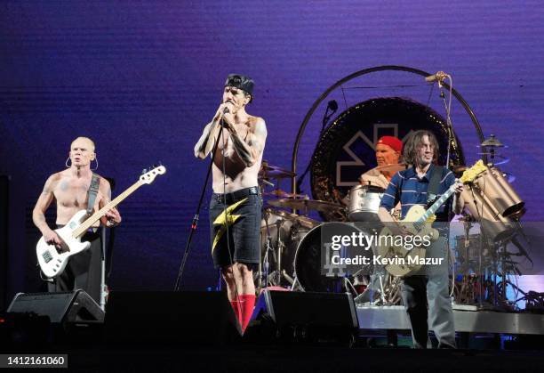 Flea, Anthony Kiedis, Chad Smith, and John Frusciante of Red Hot Chili Peppers perform at SoFi Stadium on July 31, 2022 in Inglewood, California.