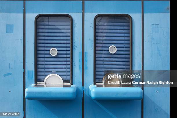 closed blue ticket booths. - loket stockfoto's en -beelden