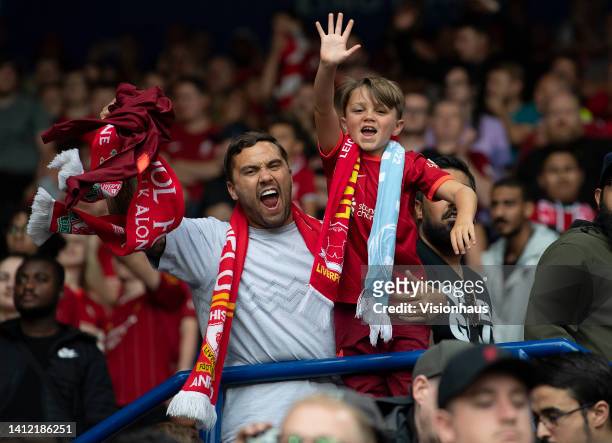 Excited father and son Liverpool fans during The FA Community Shield between Manchester City and Liverpool FC at The King Power Stadium on July 30,...