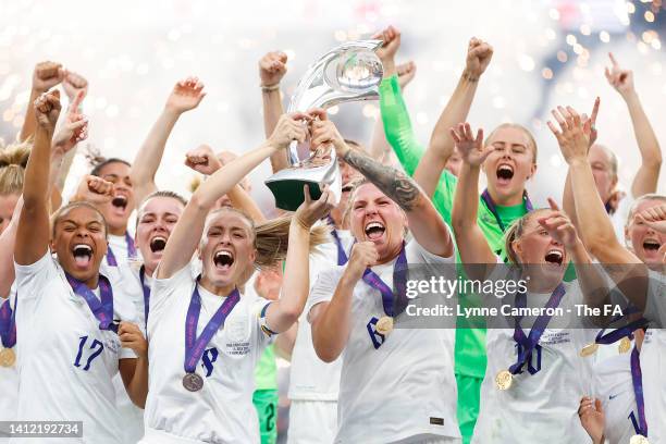 Leah Williamson and Millie Bright of England lift the UEFA Women’s EURO 2022 Trophy after their sides victory in the UEFA Women's Euro 2022 final...
