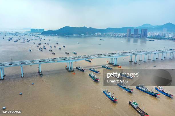 Aerial view of fishing boats setting sail for fishing on August 1, 2022 in Zhoushan, Zhejiang Province of China. The three-month fishing moratorium...