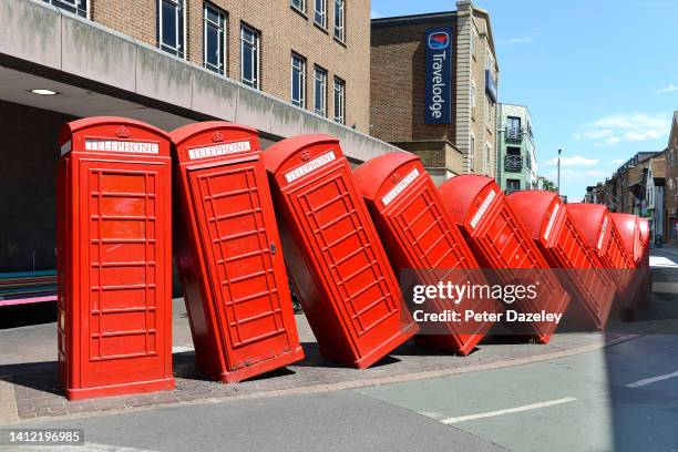 View of the Falling over telephone boxes called: “Out of Order” on Juky 15,2022 in Kingston Upon Thames, England.