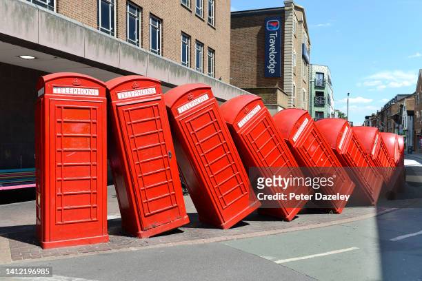 View of the Falling over telephone boxes called: “Out of Order” on Juky 15,2022 in Kingston Upon Thames, England.