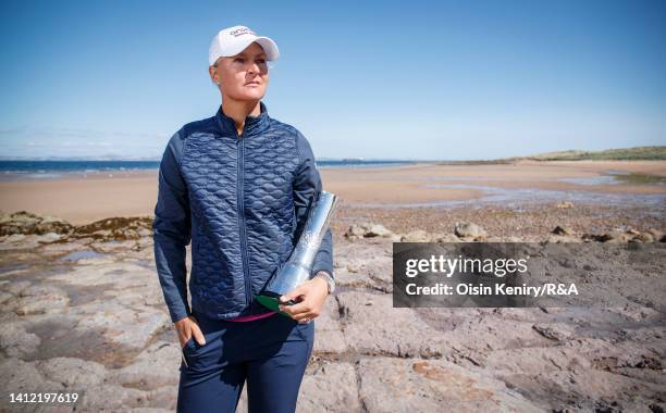 Anna Nordqvist of Sweden, 2021 Champion, poses with the AIG Women's Open trophy during a photocall prior to the AIG Women's Open at Muirfield on...