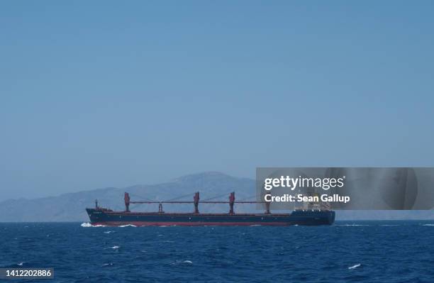 The bulk carrier merchant ship "Johanna G" travels though the Dodecanese islands on July 28, 2022 near the island of Symi, Greece. Bulk carrier ships...