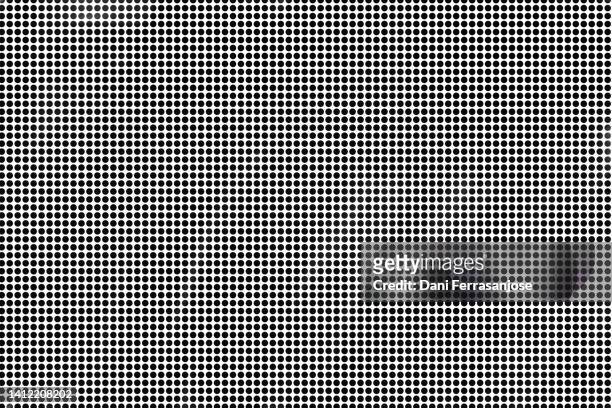 hypnotic image of black dots on white background. - specks stock pictures, royalty-free photos & images