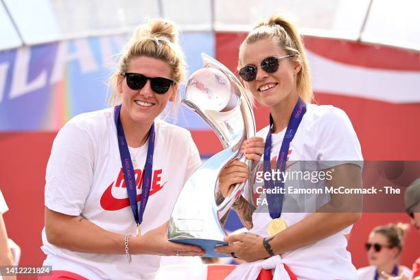 Millie Bright and Rachel Daly of England pose for a photo with the UEFA Women’s EURO 2022 Trophy during the England Women's Team Celebration at...