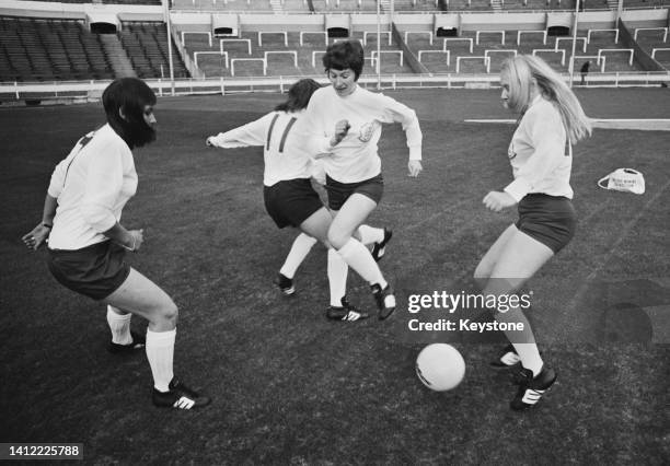 British footballer Lynda Hale, an player, British footballer Sheila Parker and British footballer Jeannie Allott during an England Women's football...