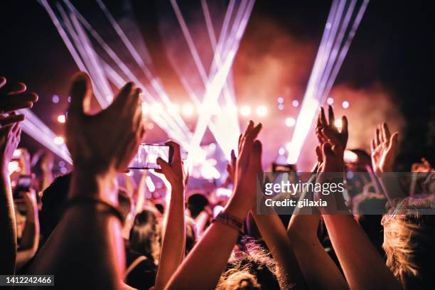 rave party. - music festival stock pictures, royalty-free photos & images