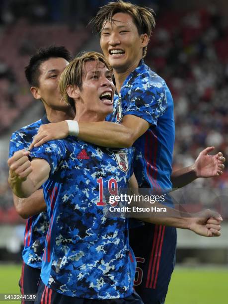 Sho Sakai of Japan celebrates scoring his side's second goal during the EAFF E-1 Football Championship match between Japan and South Korea at Toyota...