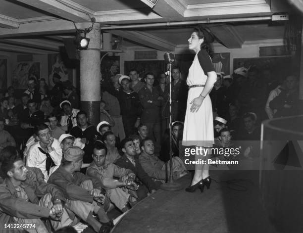 Scene at New York's famous Stage Door Canteen, where the great and small of show business entertain service men under the auspices of the American...