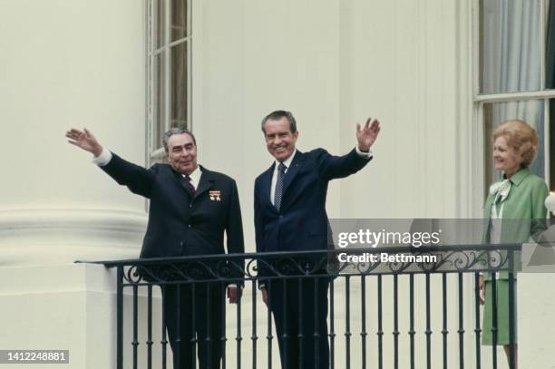 President Richard Nixon and Pat Nixon on the White House balcony with visiting Soviet Communist Party chief Leonid Brezhnev.