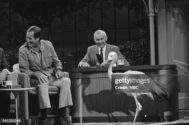 Air Date -- Pictured: Zoologist Jim Fowler, host Johnny Carson with a crane that has an artificial leg -- Photo by: Ron Tom/NBCU Photo Bank