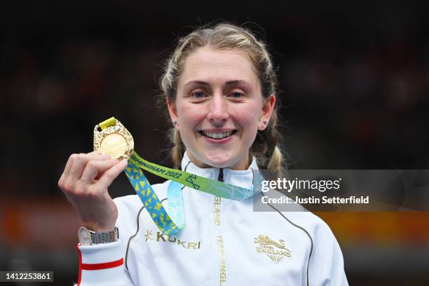 Gold Medalist, Laura Kenny of Team England celebrates with their medal during the Women's 10km Scratch Race medal ceremony on day four of the...