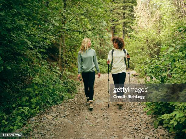 women friends hiking outdoors - utah hiking stock pictures, royalty-free photos & images