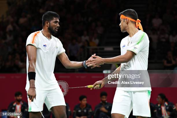Chirag Chandrashekhar Shetty and doubles partner Satwik Sairaj Rankireddy of Team India shake hands during their Mixed Team Event Semi-Final Men's...